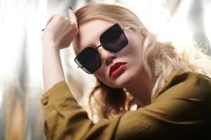 Beautiful blonde lady wearing fashionable sunglasses